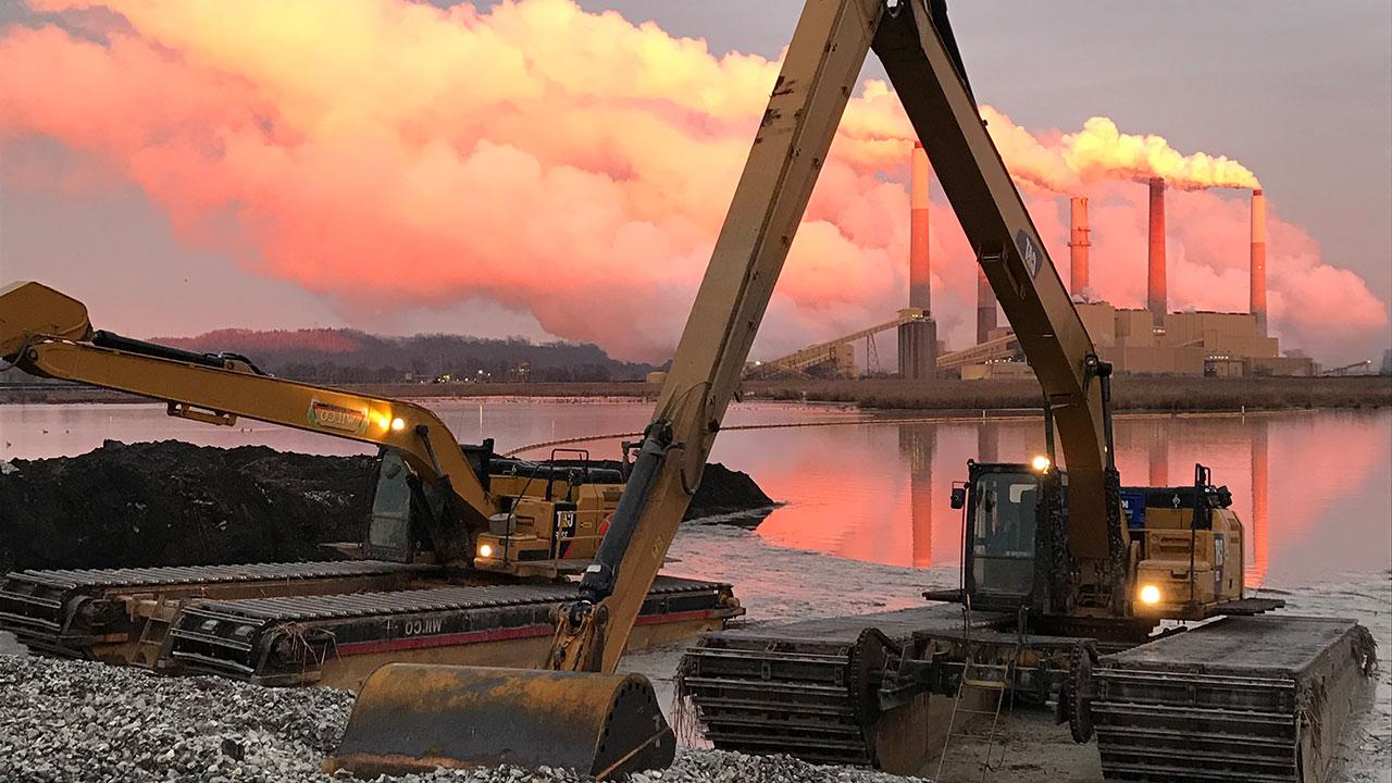 Floating excavators at Kentucky Utilities CCR site in Ghent, Kentucky